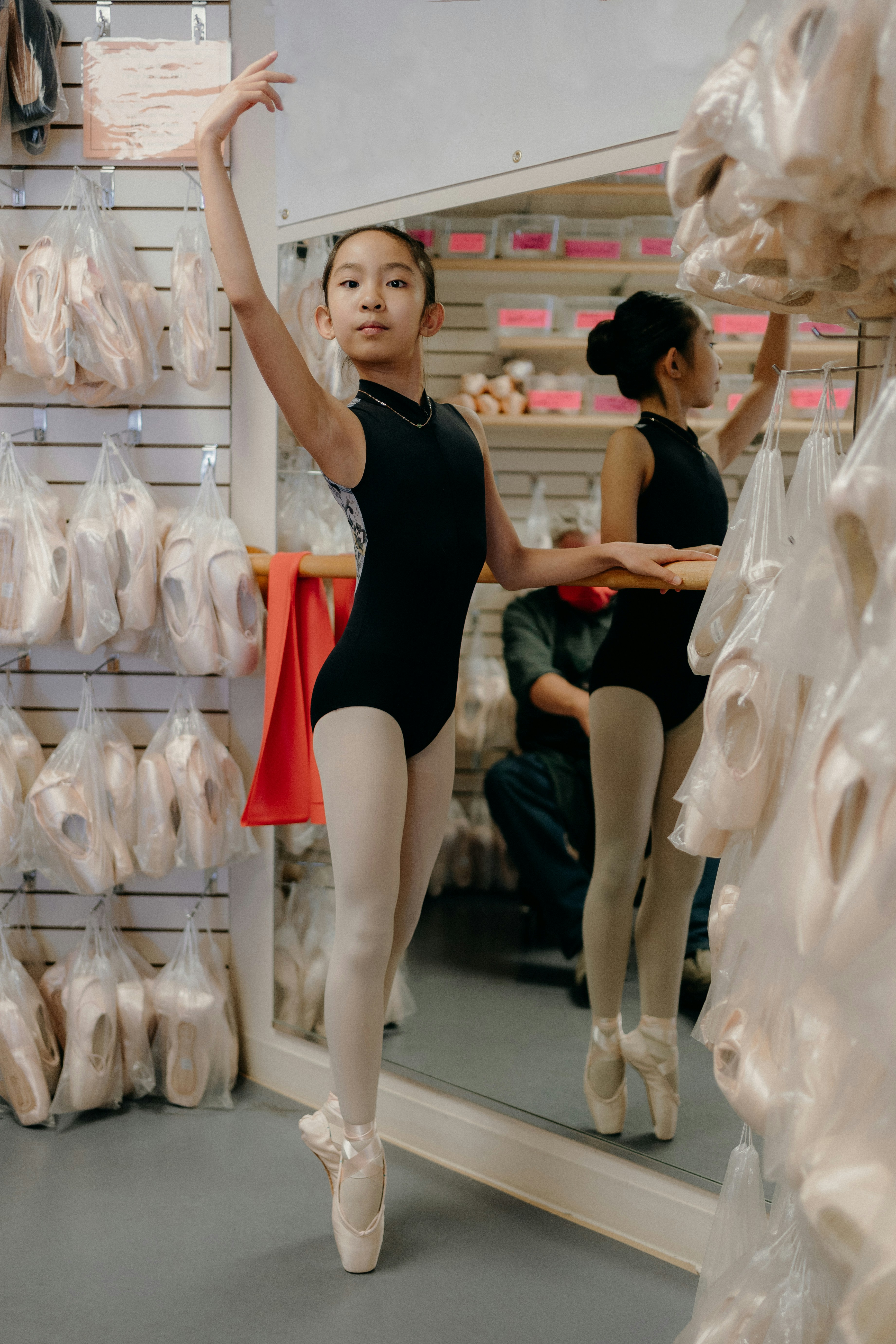 A child preparing for a dance class